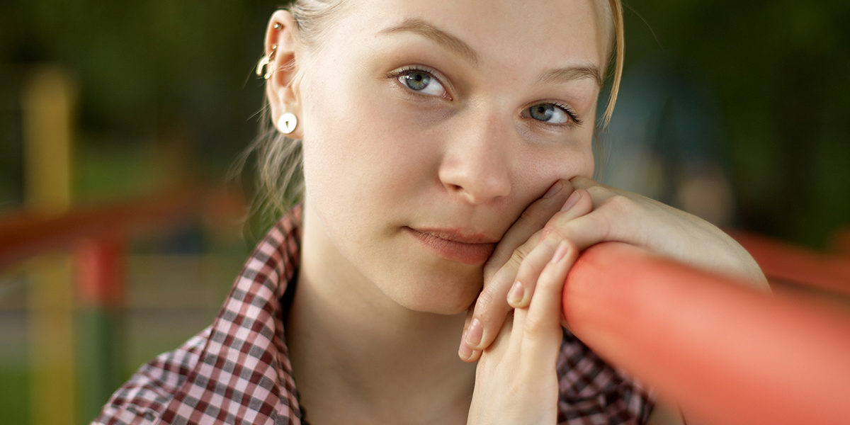 young woman thinking about what makes the best rehab