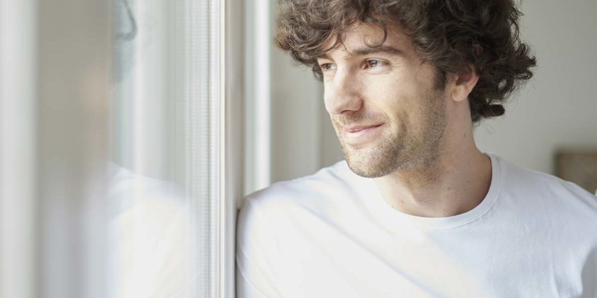 man smiling at alcohol residential treatment centers