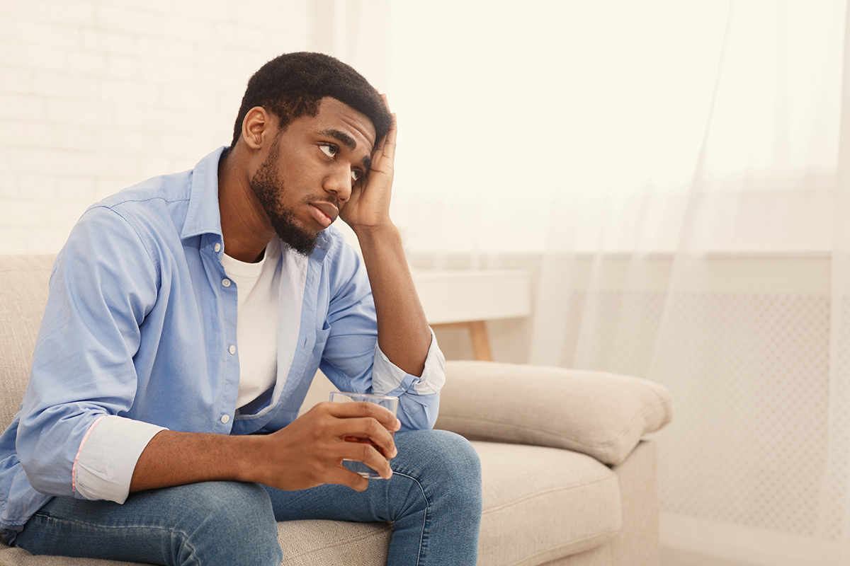 man struggling with alcohol detox at home