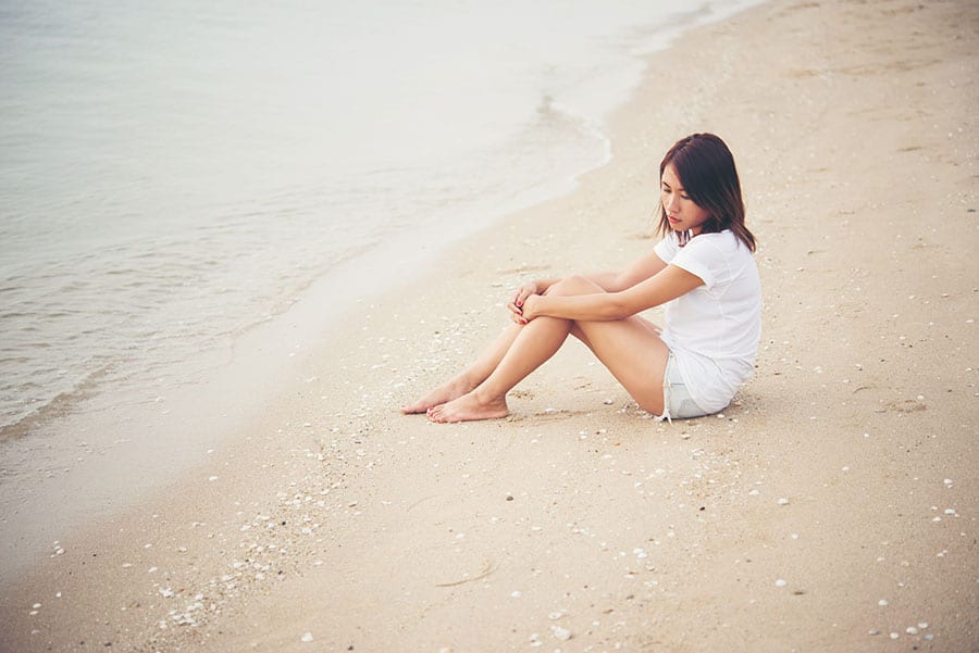 Lonely girl on beach needs benzo detox at Beaches