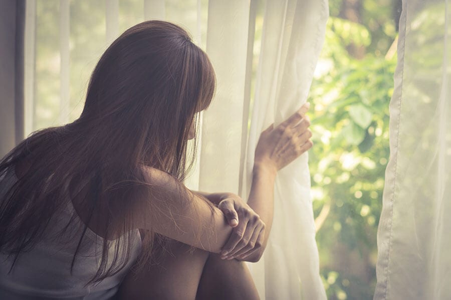 Girl looking out window never thought she'd get addicted to lean drink.
