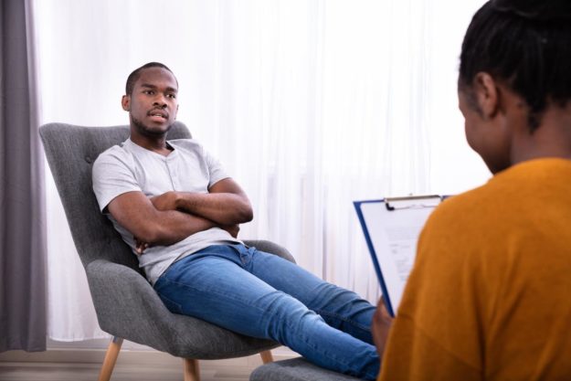 young male in therapy