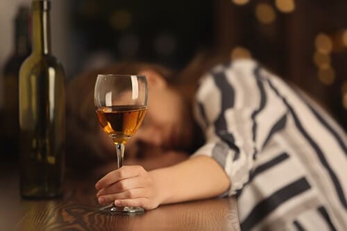 Drinking too much wine may be one of the signs and symptoms of alcoholism