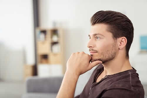 Man looking off in the distance needs life skills training as well as rehab