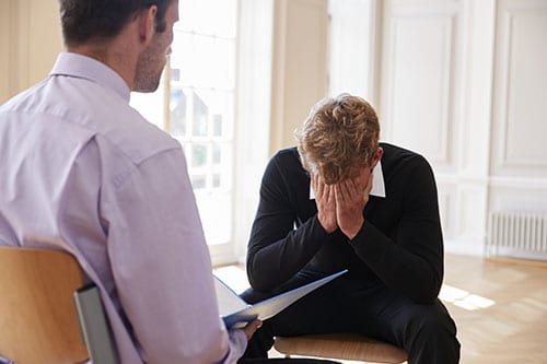 Man losing it with his therapist at PTSD treatment program