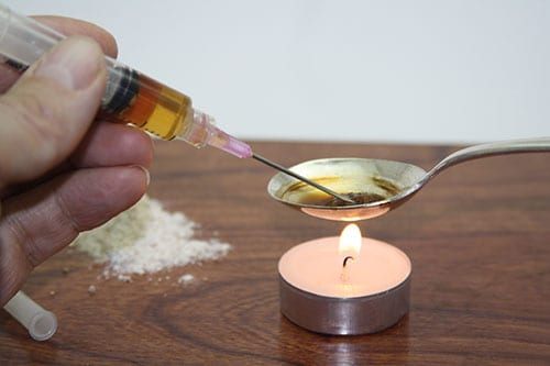 What is black tar heroin and how is it different from the powder