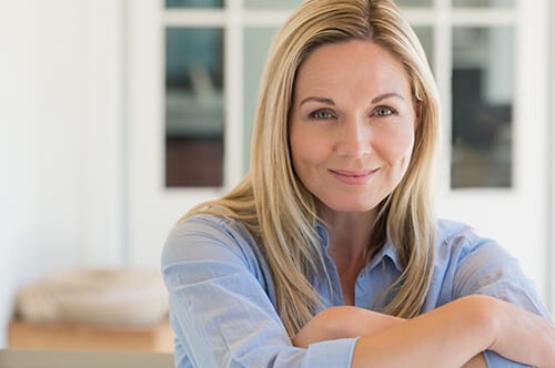 Woman smiling because she has found first night 2018 activities for her family