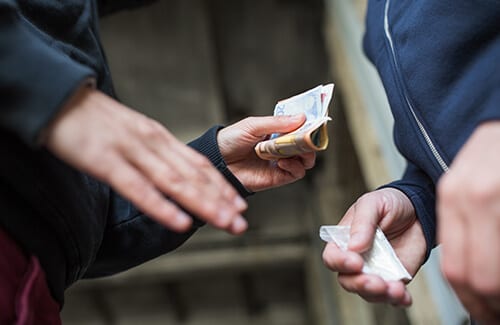 Money exchanging hands for suboxone strips on the black market