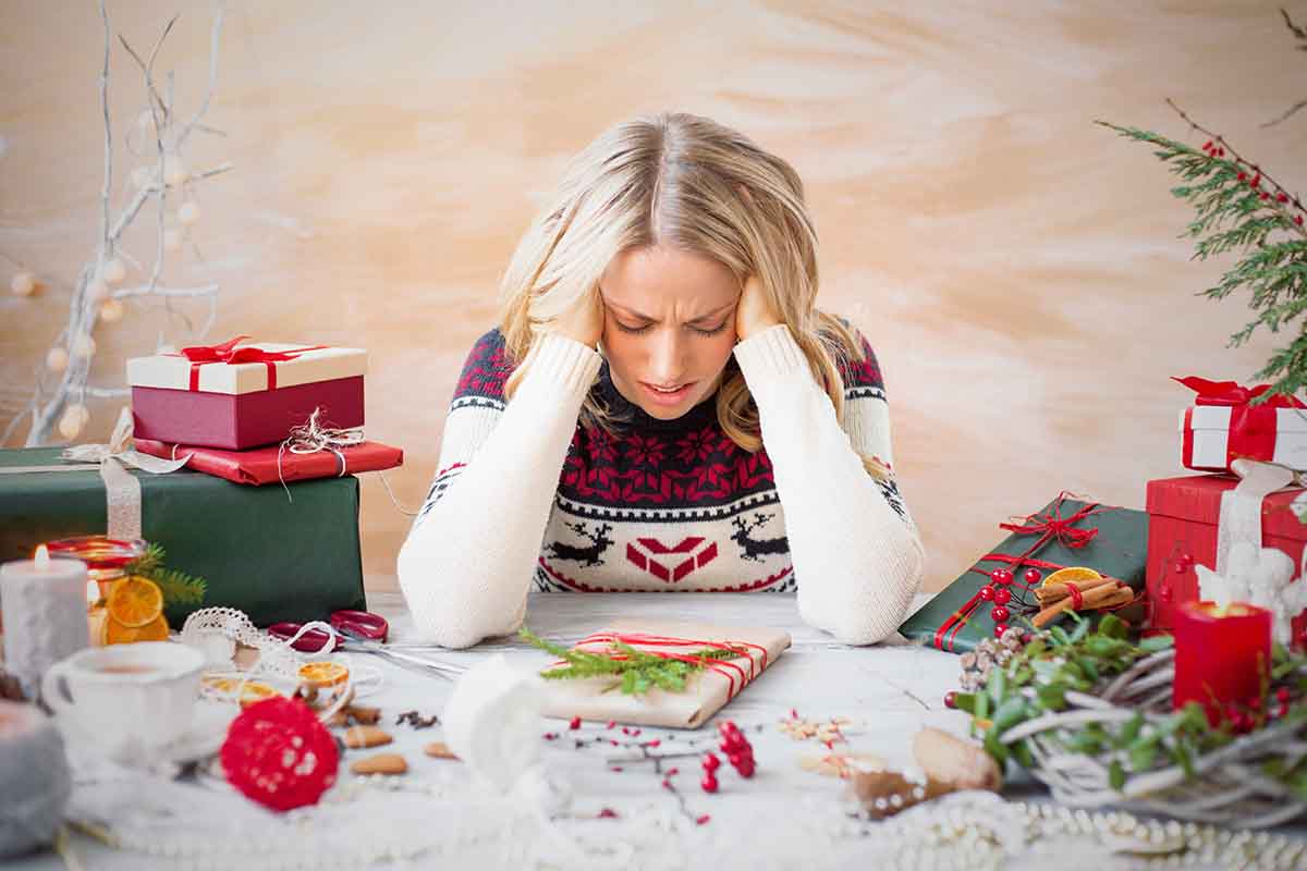 women leaning on her hands during the holidays