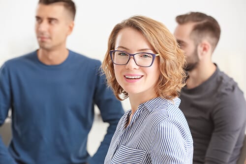 Smiling woman nows how to have fun sober