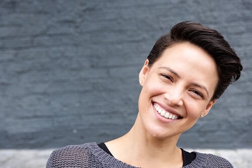 Smiling woman ready to live life without alcohol