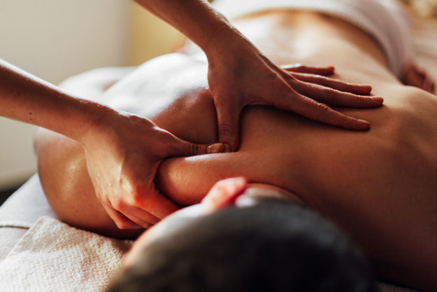woman gets massage therapy during addiction recovery