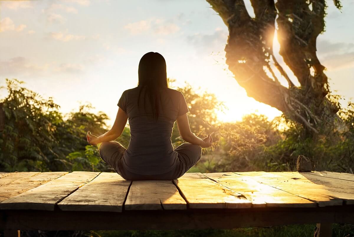 woman meditating and making amends during recovery