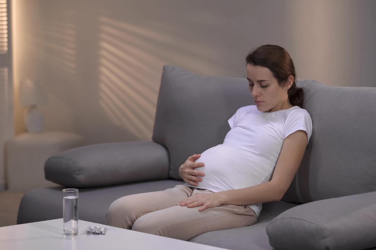 pregnant woman sitting down