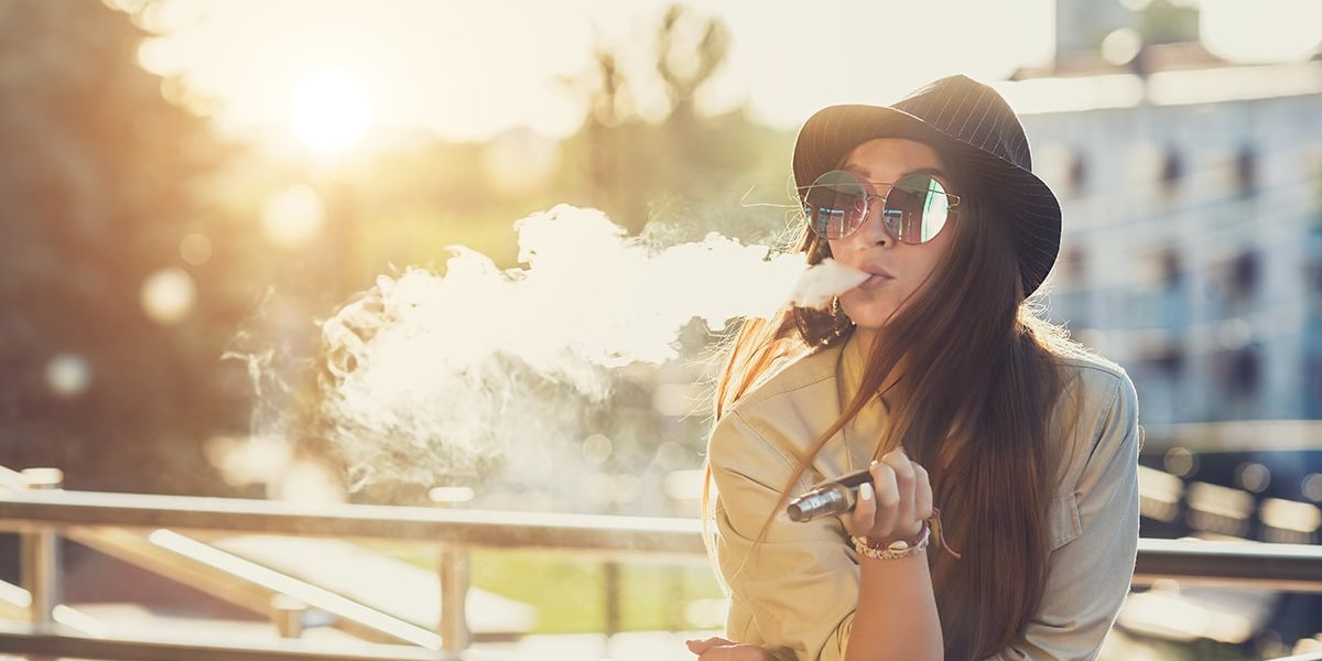 Woman who is unaware of the dangers of vaping marijuana