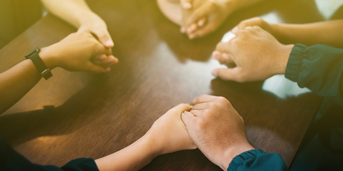 People praying together at one of the many faith based recovery programs around the country