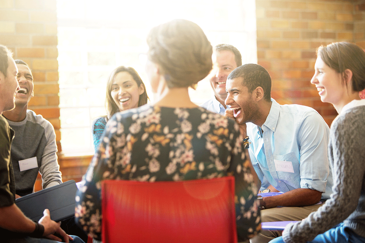 A group of people discussing the question, "What is rehab like?"