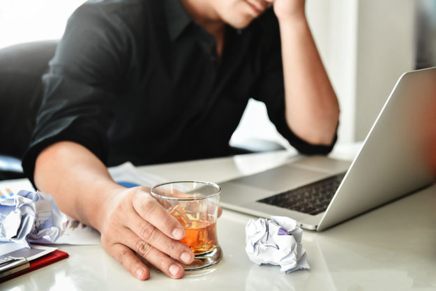 man wonders why he's drinking at work