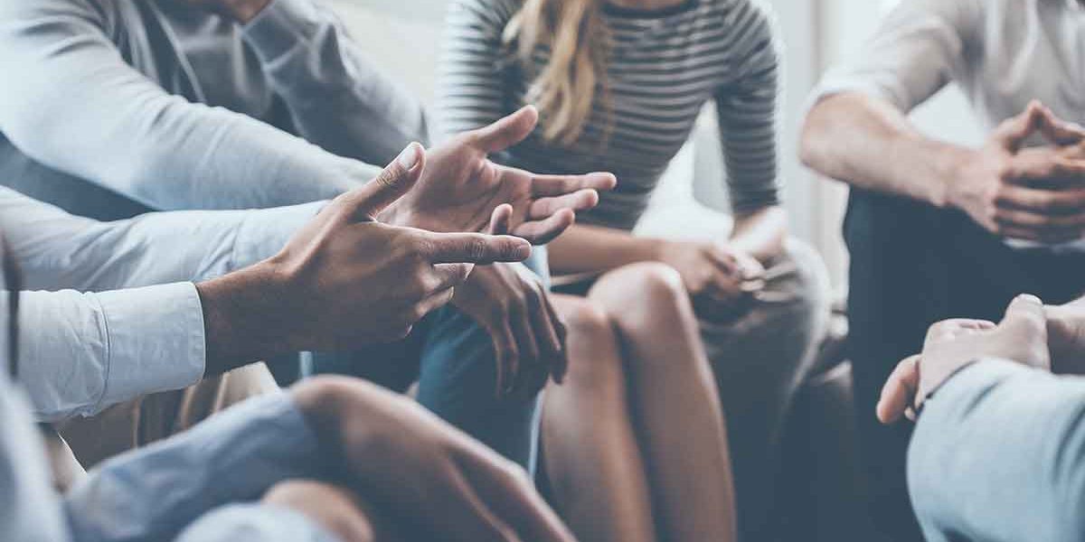 group of people in a therapy session