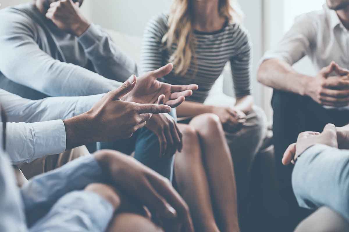 group of people in a therapy session