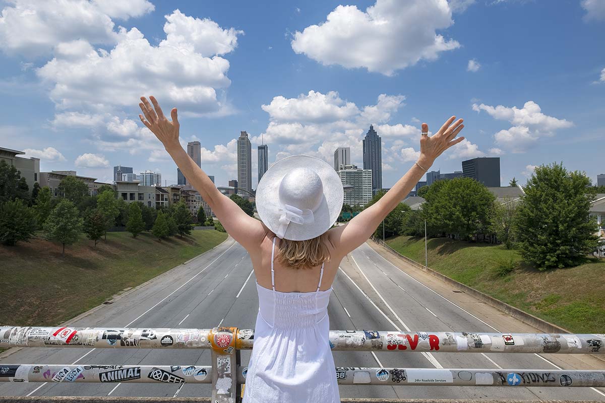 woman with arms outstretched after visiting women's alcohol addiction rehab atlanta ga