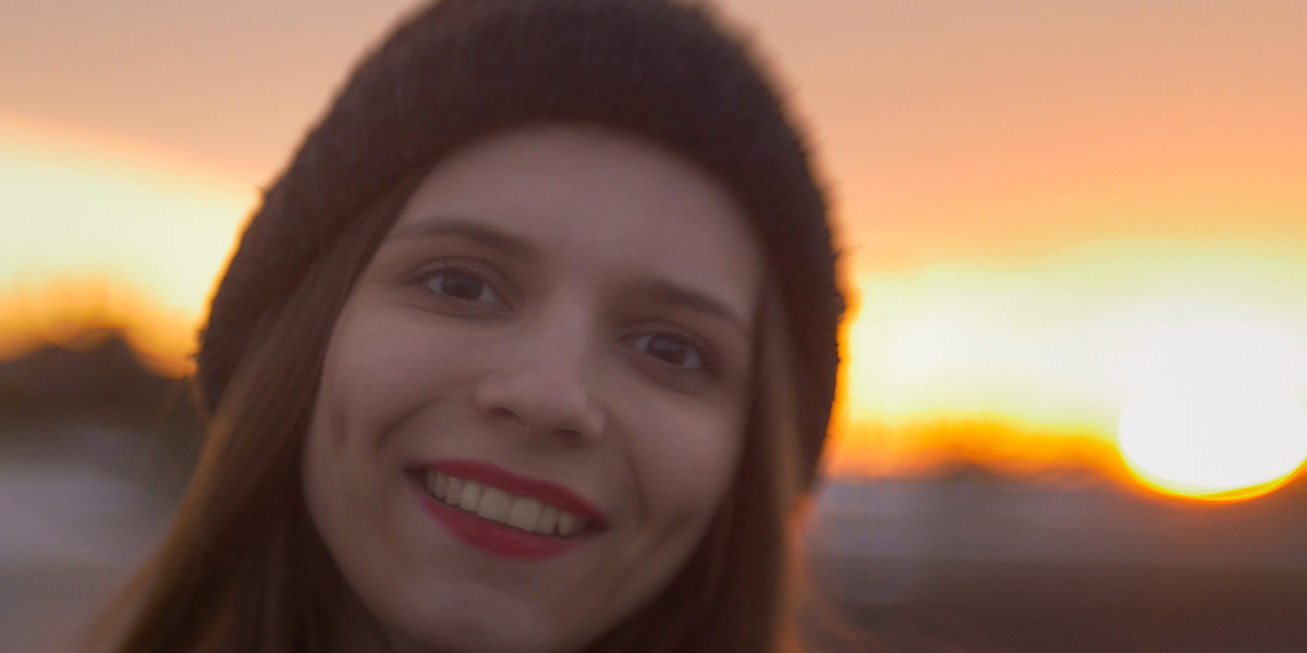 woman smiling at sunset outside the Rehab Center in Jacksonville