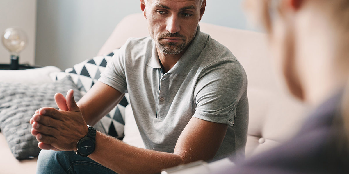 middle-aged man deep in thought during Drug Addiction Therapy