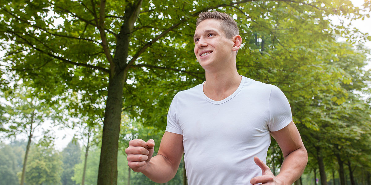 man jogging in the park for the guided self help program