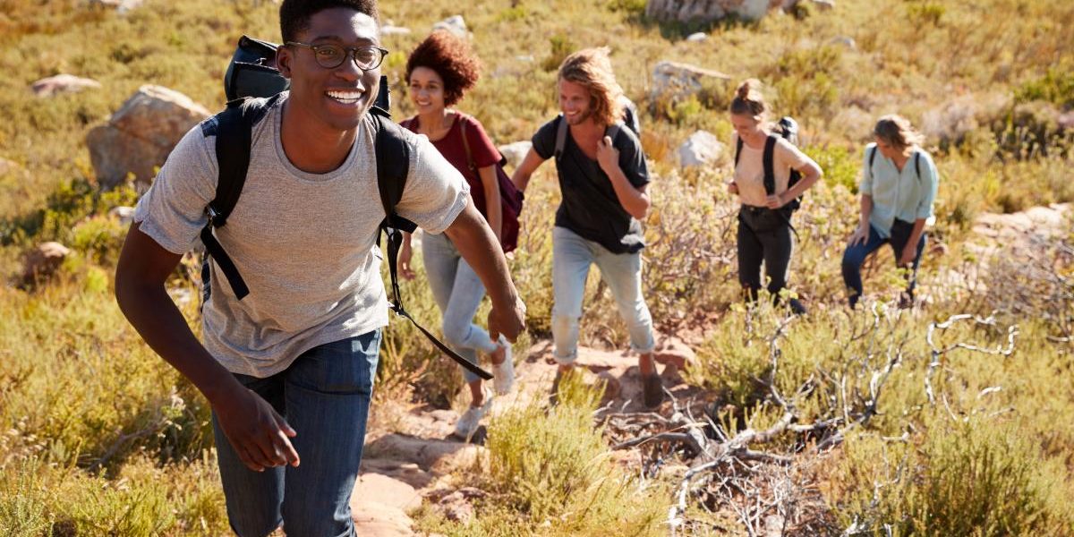 group going on hike to stay sober