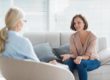 woman talking to therapist about addiction recovery support groups