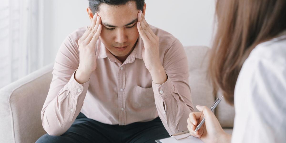 man talking to doctor looking for help for prescription drug addiction